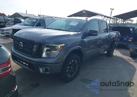 2019 Nissan Titan Pro-4X из США, поврежденный, VIN 1N6AA1E58KN520526
